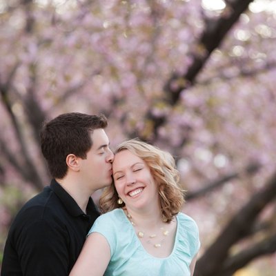 Engagement photo under the cherry blossoms