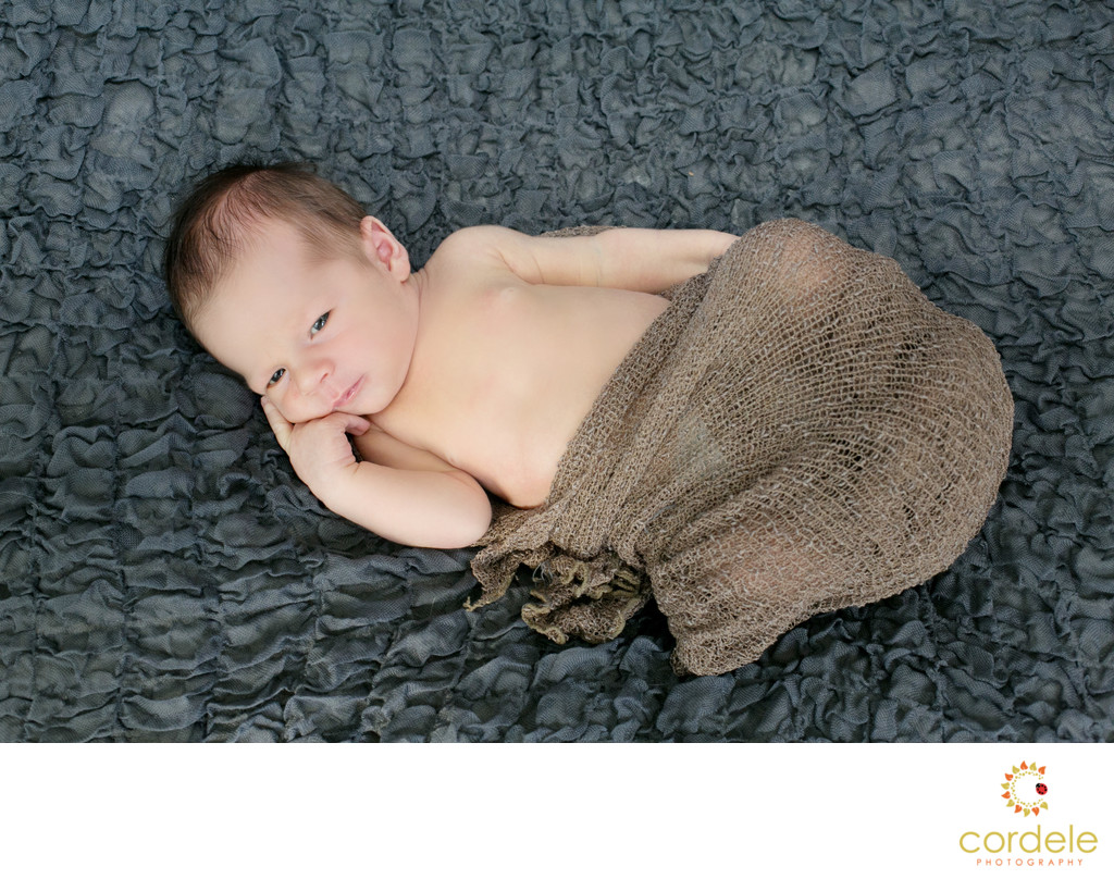 Newborn Photos of baby on blue blanket Reading MA