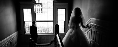 Boston wedding photographs of bride on the stairs at the Lyman Estate. 