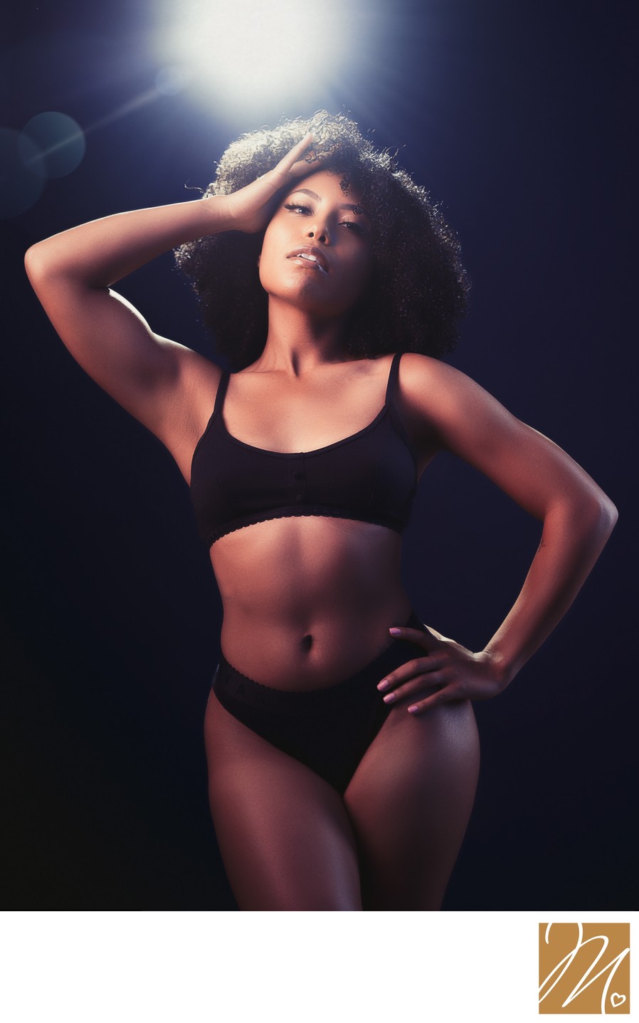 Boudoir Photographer Dramatic Studio Portrait With Backlight and Strong Pose