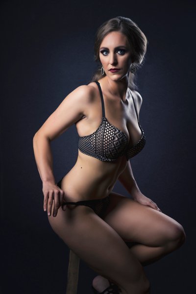 Boudoir Photographer Studio Portrait With Dramatic Low-Key Lighting