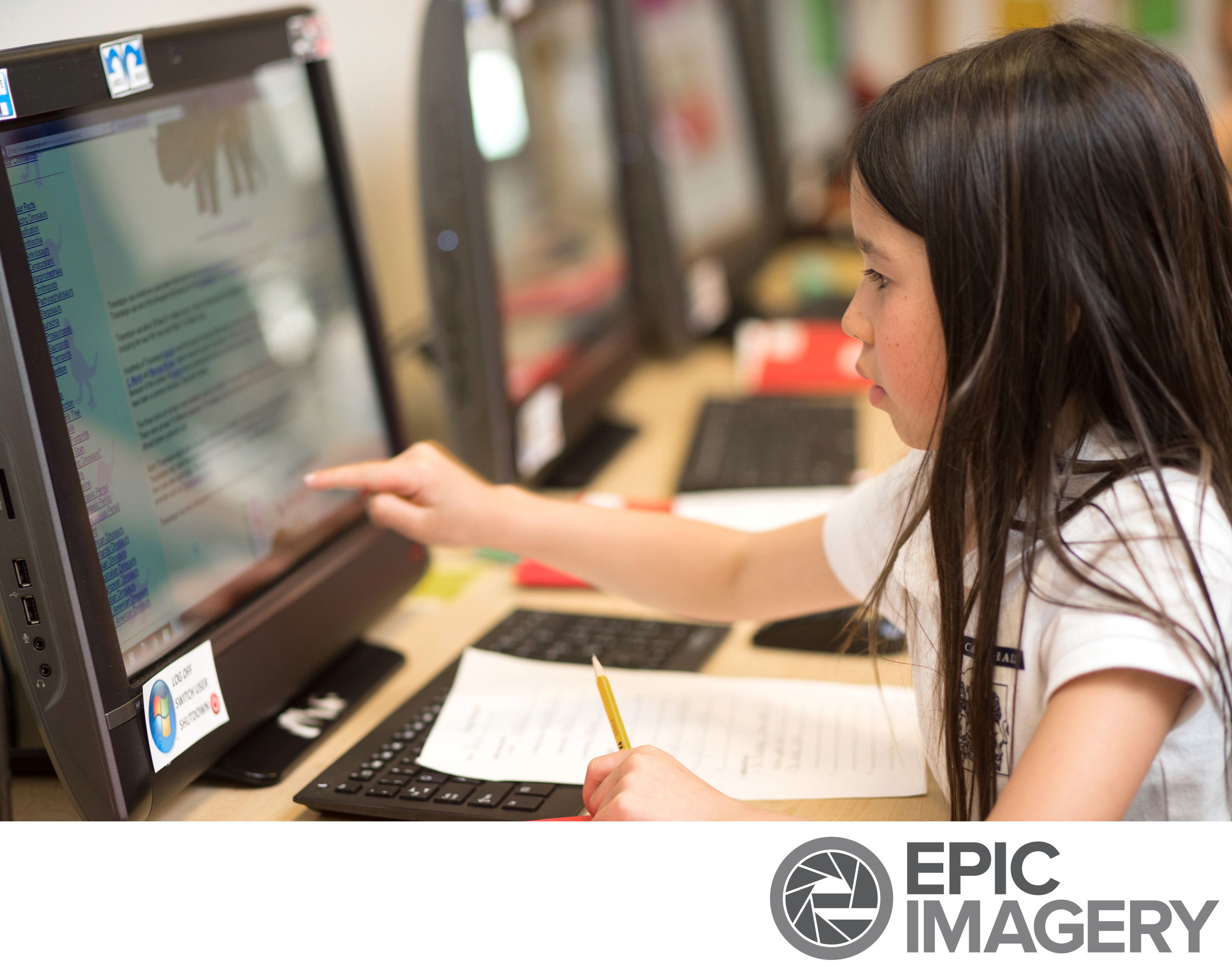 Elementary Student Learning Computers