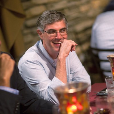 Candid Social Interaction at Business Dinner