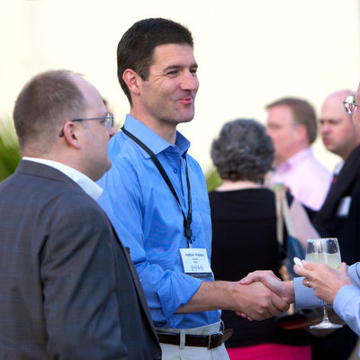 Business Professionals Connecting at Dinner Event