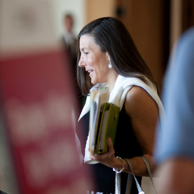 Attendee Checking in at Corporate Meeting