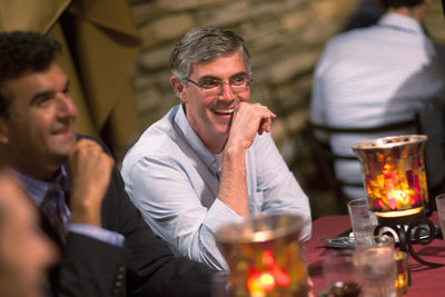 Candid Social Interaction at Business Dinner