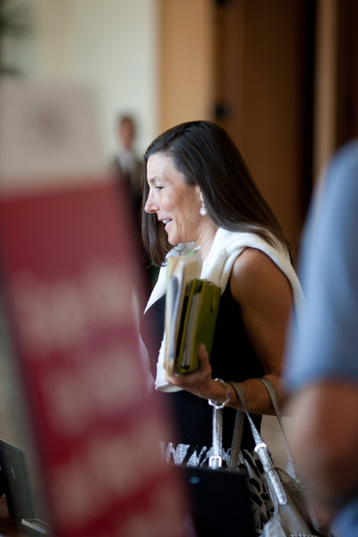 Attendee Checking in at Corporate Meeting