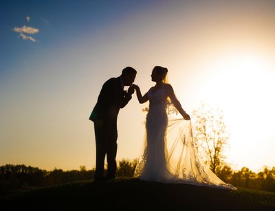 Silhouette of Bride and Groom: Sunset