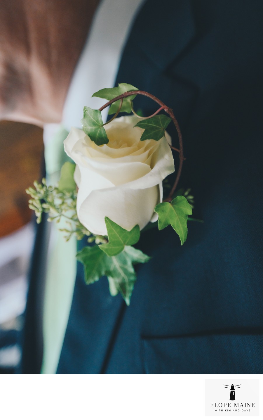 Elope Maine provides a boutonniere and bouquet! 