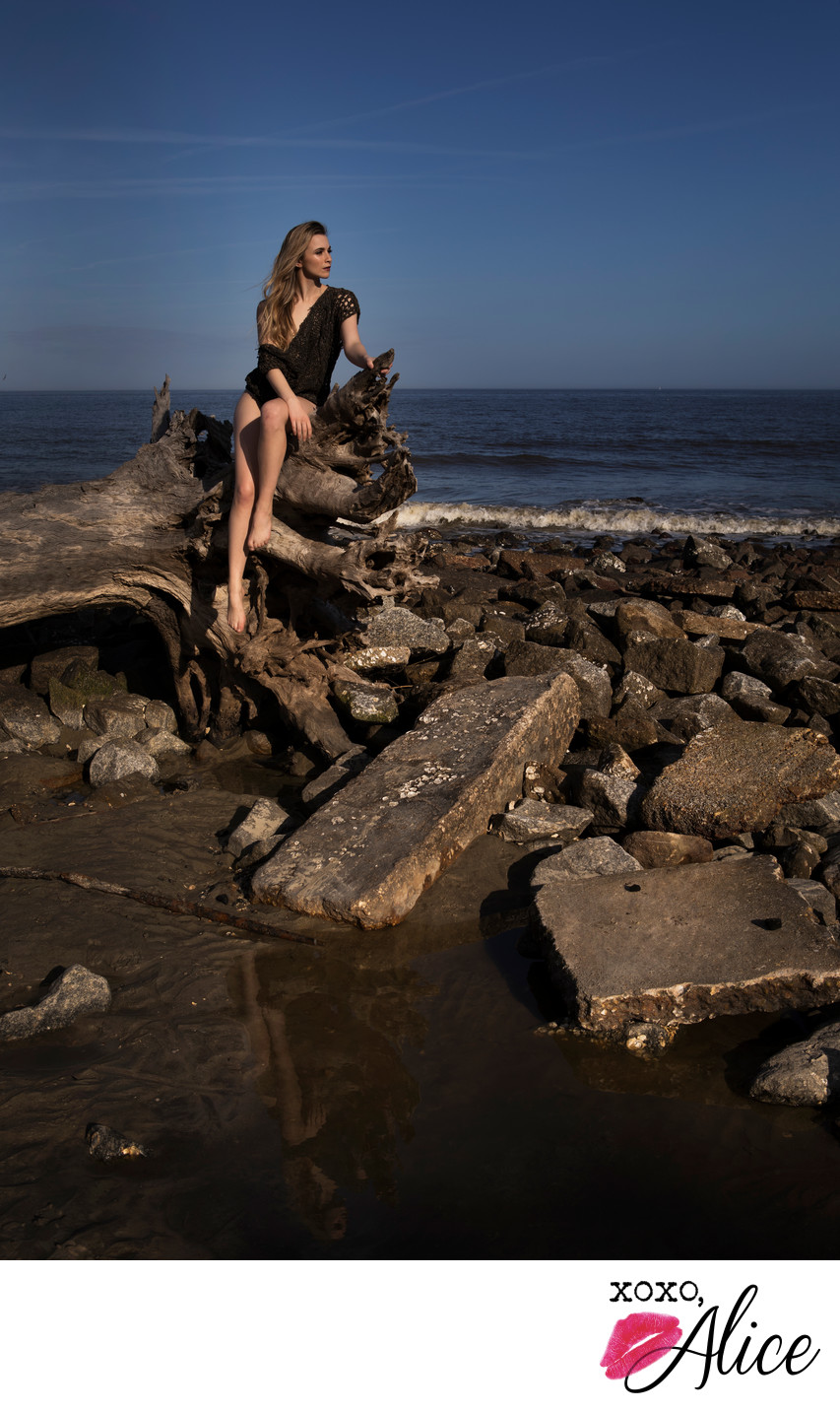 Epic beach photoshoot with driftwood and woven leather