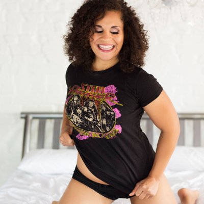 casual sexy boudoir photos with band t-shirt and smiles