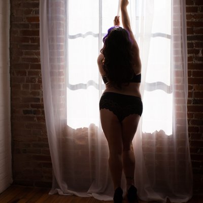 Sexy silhouette boudoir photography with a window