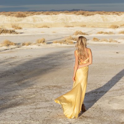 yellow silk dress in the desert boudoir fashion photos