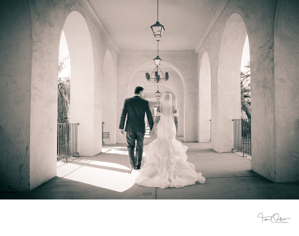 Bride and Groom at Balboa Park walking to reception