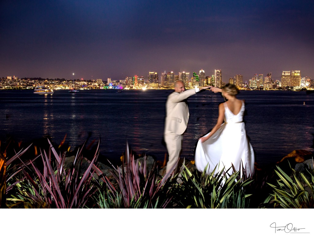 bride and groom with san diego skyline