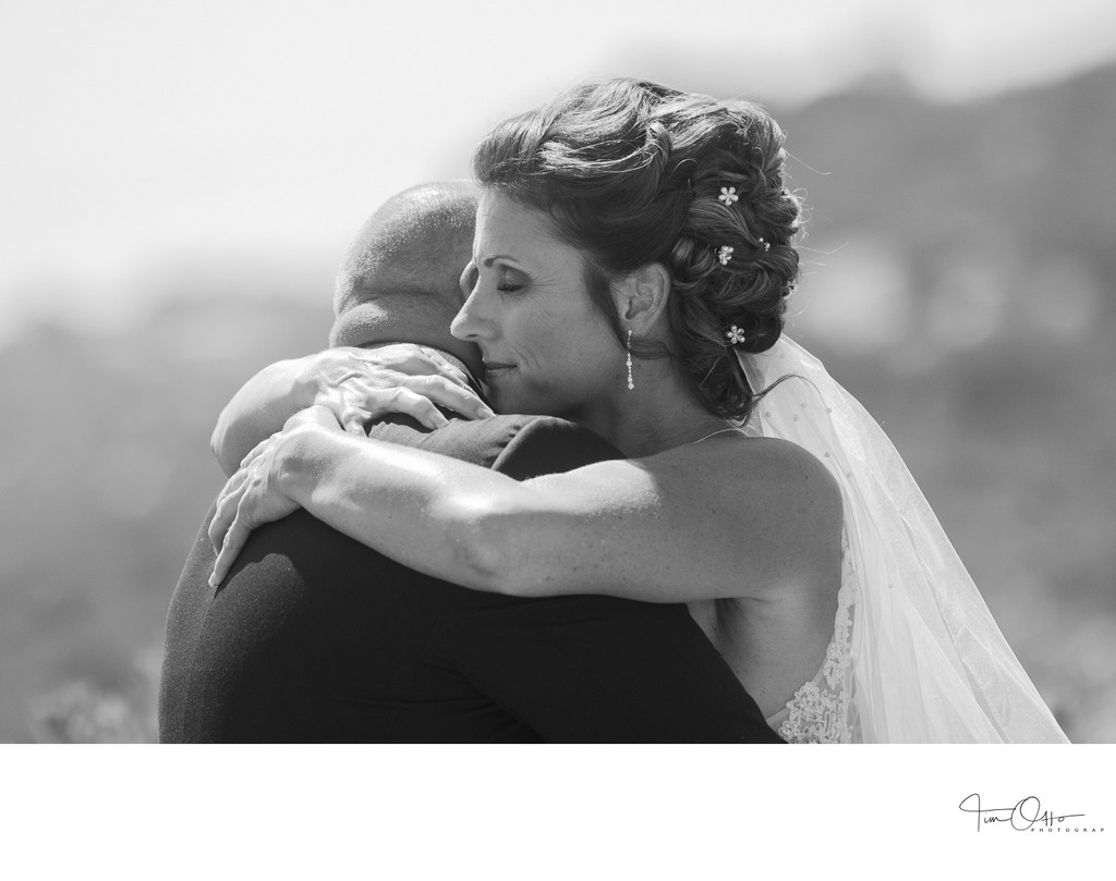 candid moment with bride and groom first site