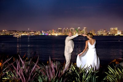 bride and groom with san diego skyline