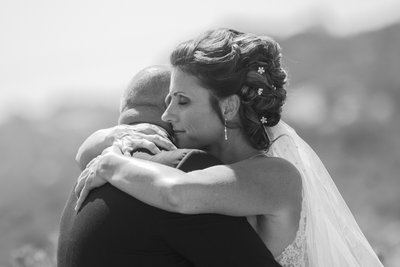 candid moment with bride and groom first site