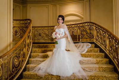 bride on stairs at Westgate hotel,
