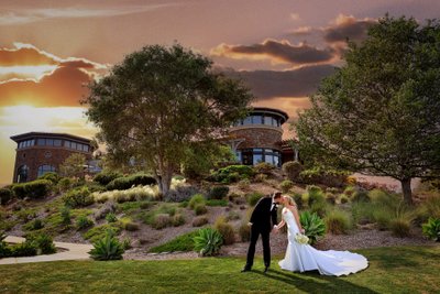 The crossings bride and groom at sunset