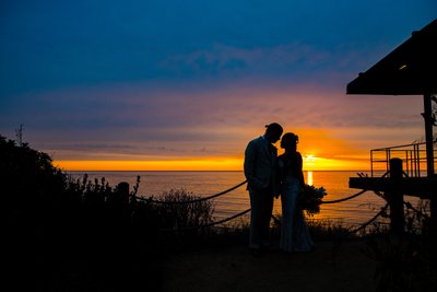 bride and groom at the Martin Johnson House at sunset