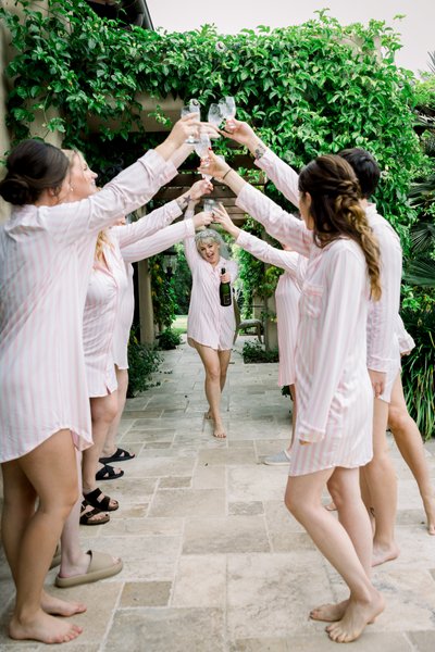 Champagne toast with bride and bridesmaids