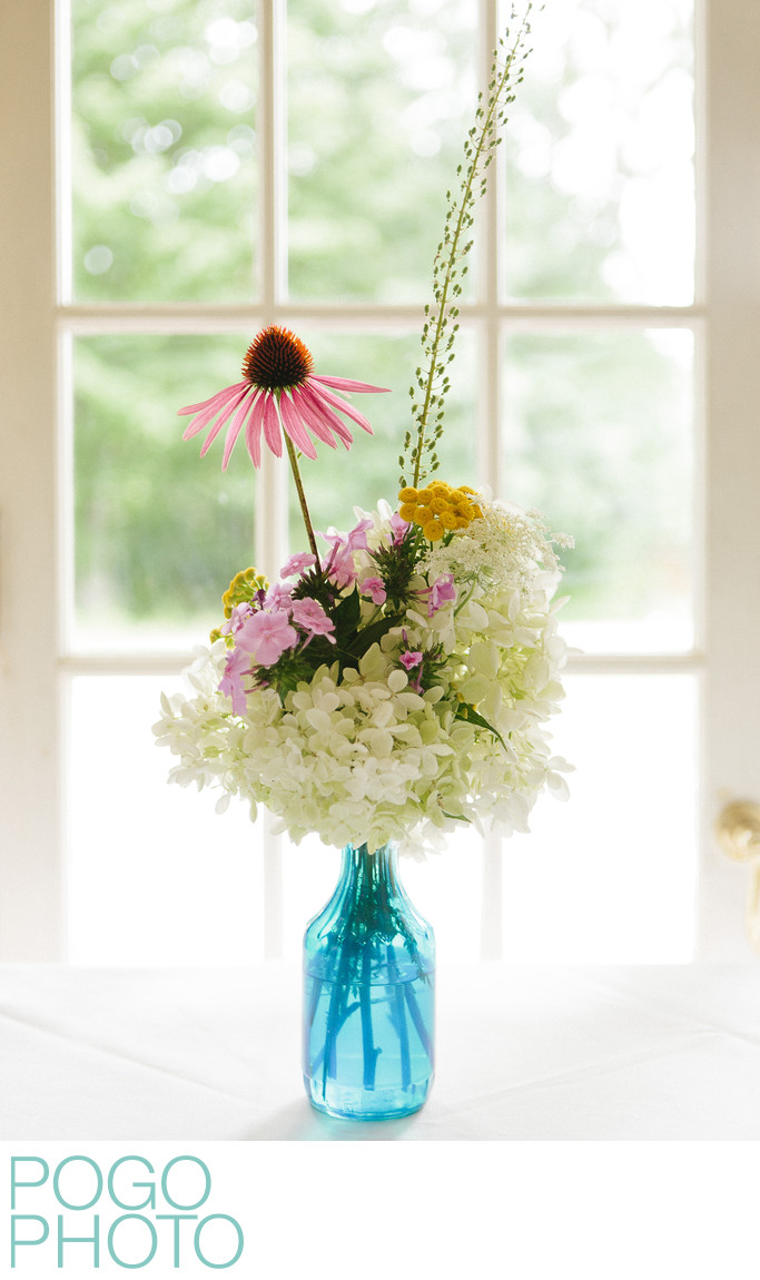 The Pogo Wedding: wildflowers in sheer blue vases