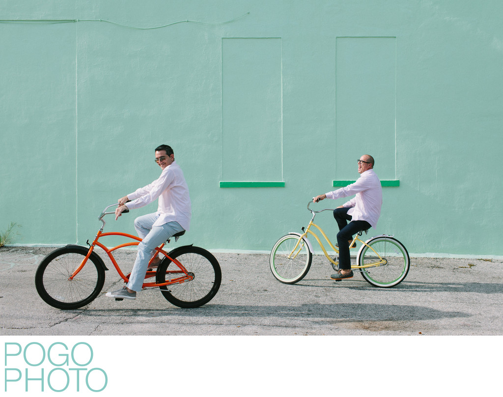 Playful South Florida Gay Engagement Photo with Bikes 