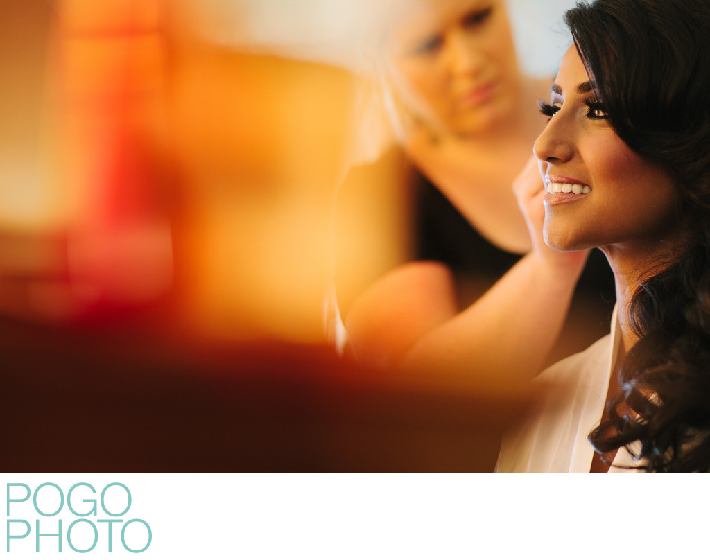Makeup Artist Working on Bride in Colorful Prep Image
