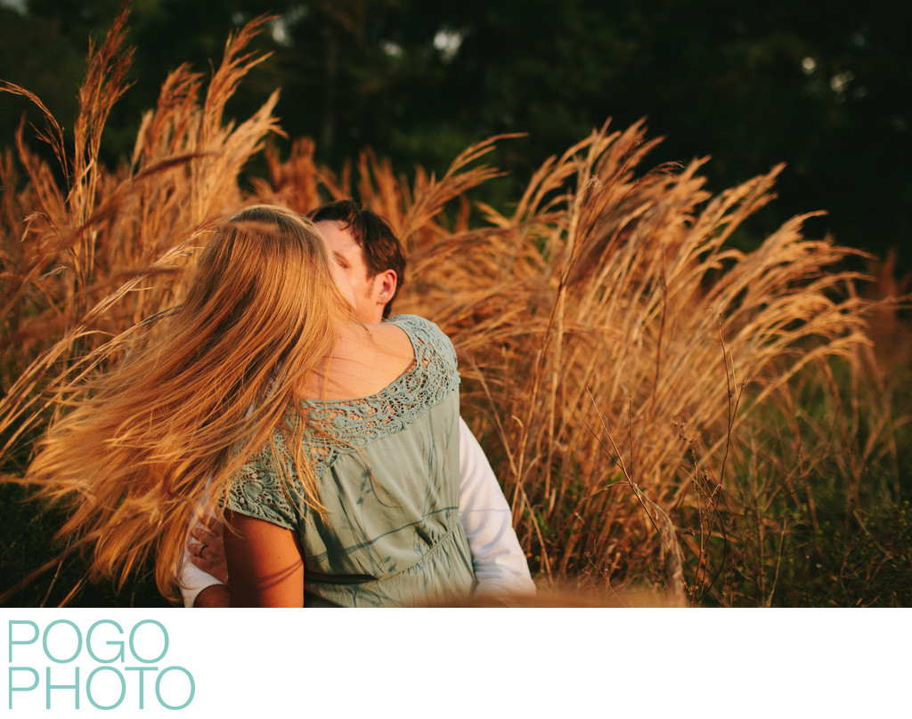 Rural FL Engagement Photography in Tall Grass at Sunset