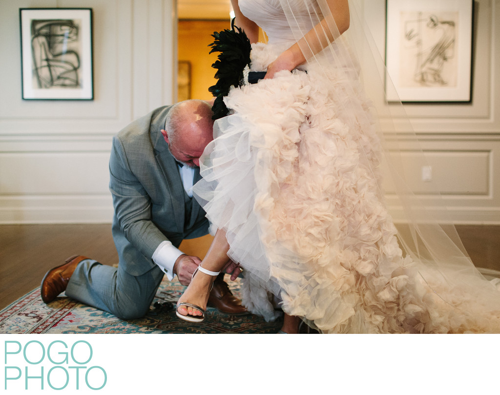 Dad Assists Bride with Shoe at Norton Museum of Art