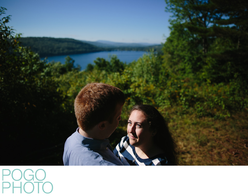Vivid Engagement Photos Overlooking Secluded VT Lake