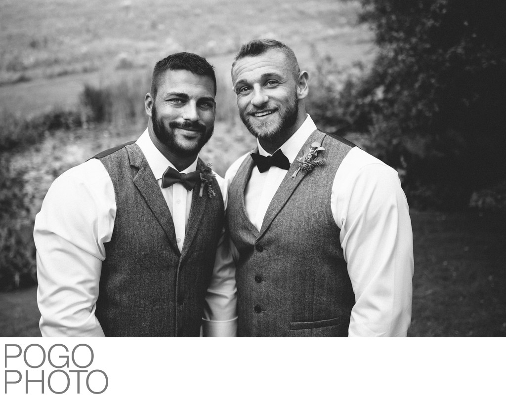 Timeless Image of Two Smiling Grooms at The Round Barn