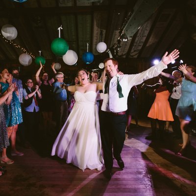 Exuberant Bride and Groom Celebrate at VT Camp Lodge 