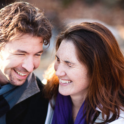 Laughing engagement portraits in Central Park