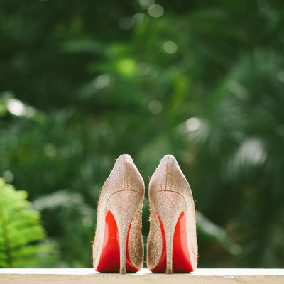 Sparkly Louboutin red soled wedding shoes in Palm Beach