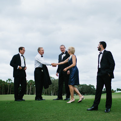 Candid family photo by documentary wedding photographer