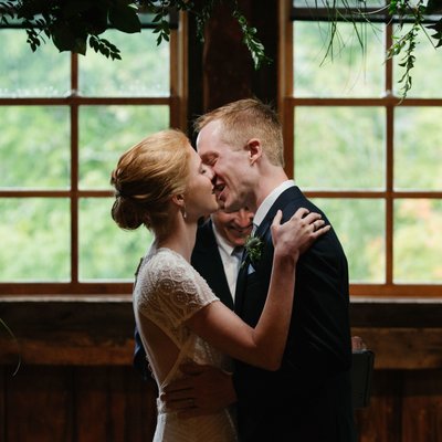 Skinner Barn Photographers Capture Bride and Groom Kiss