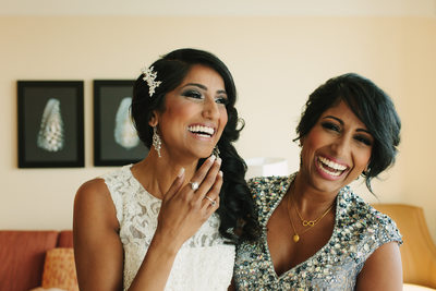 Excited sisters laugh on wedding day in West Palm Beach