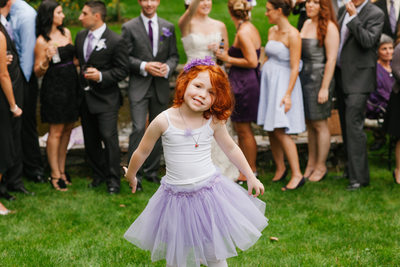 Vermont Flower Girl in Purple Tutu Goofs Off at Wedding