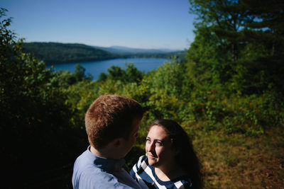 Vivid Engagement Photos Overlooking Secluded VT Lake