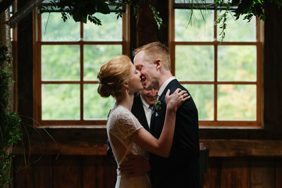 Skinner Barn Photographers Capture Bride and Groom Kiss