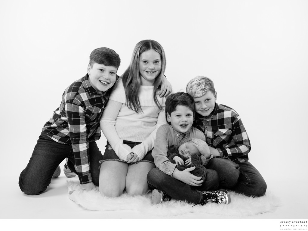 Newborn with Four Older Siblings