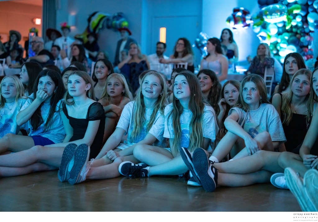 Girls Watching Slideshow at Bat Mitzvah
