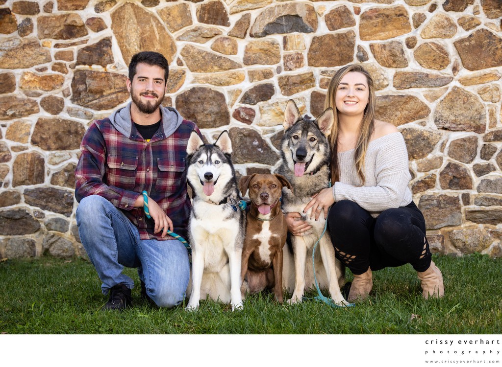 Couple with Three Dogs