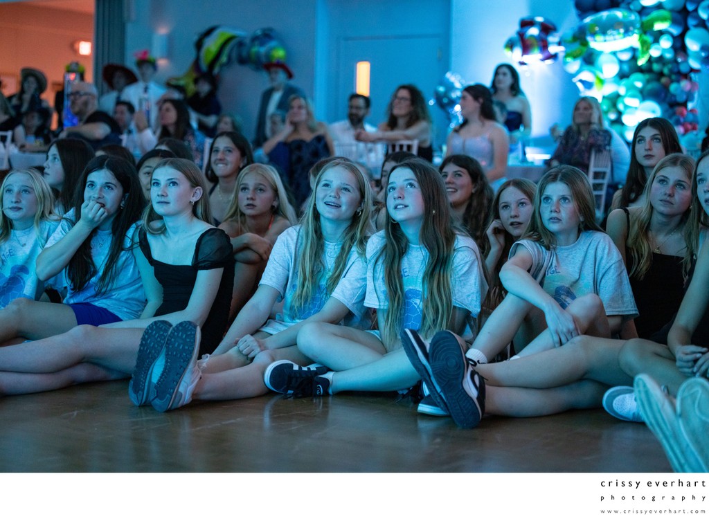 Girls Watching Slideshow at Bat Mitzvah