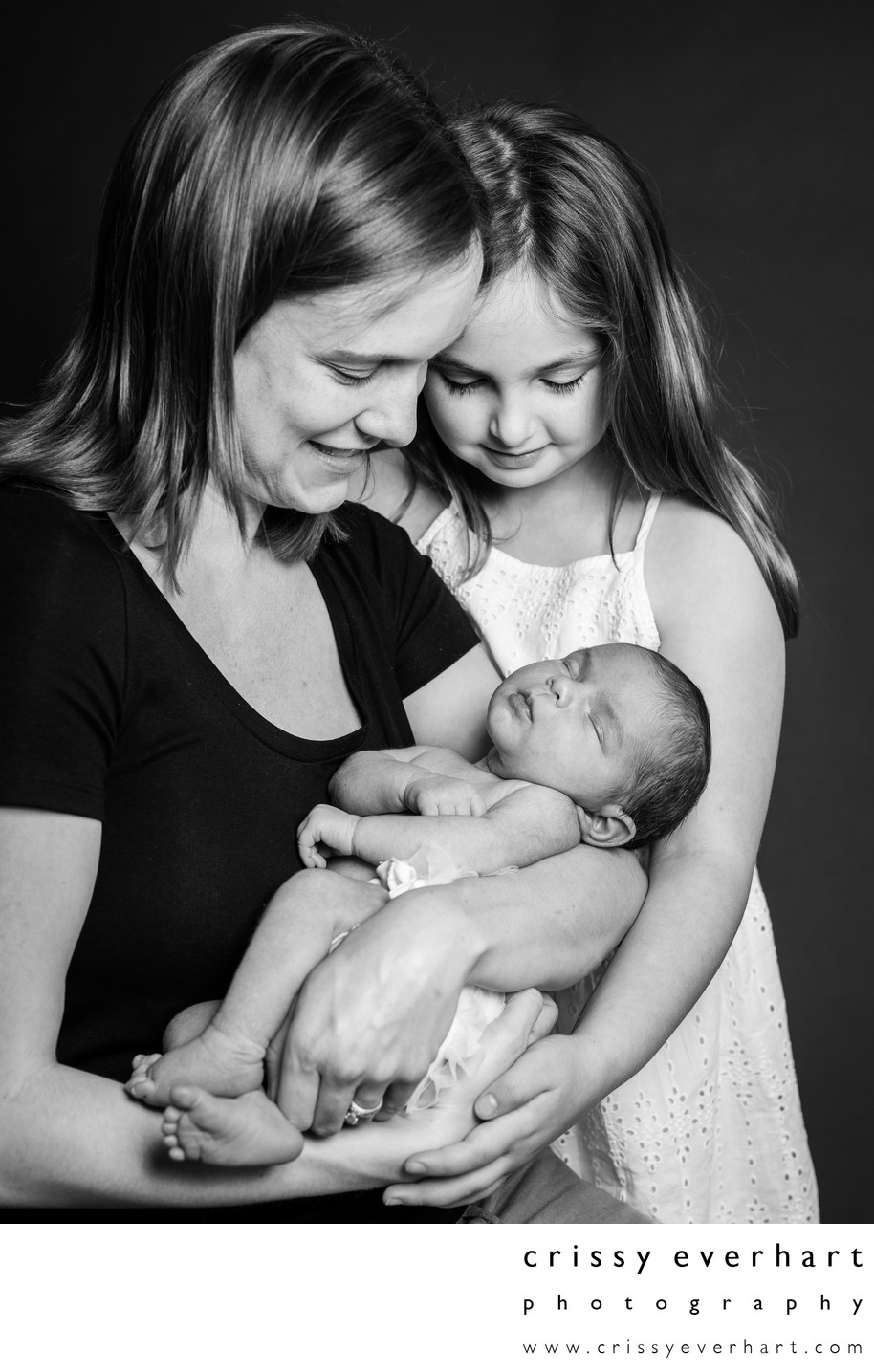 Mom and Daughters at Newborn Session