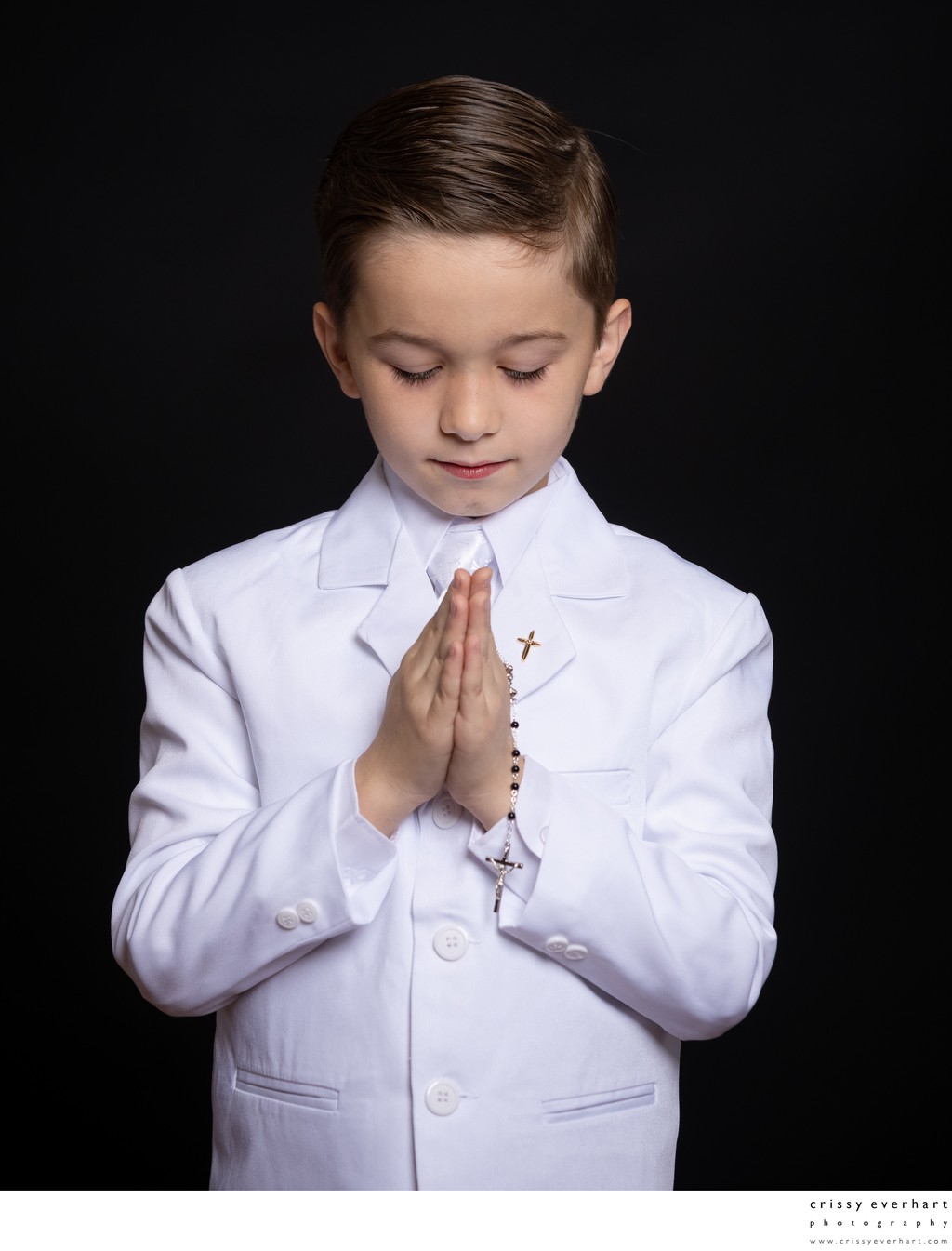 Communion Photo of Boy Praying with Rosary Beads