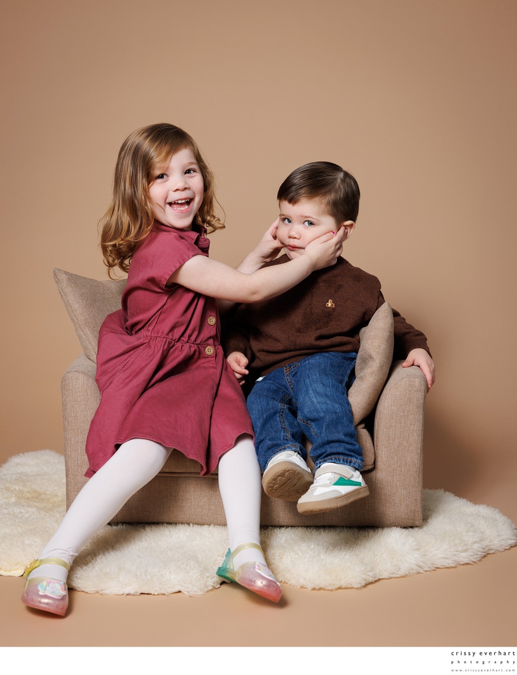 Big Sister Helps Brother Smile at Picture Day