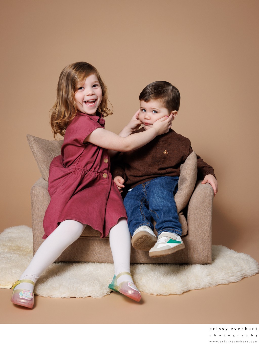 Big Sister Helps Brother Smile at Picture Day